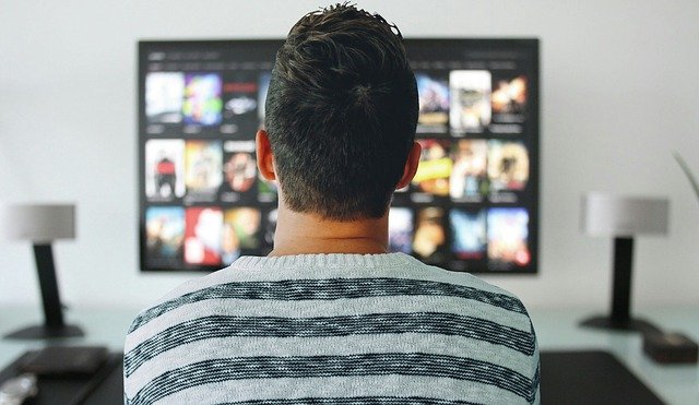 a person watching tv
